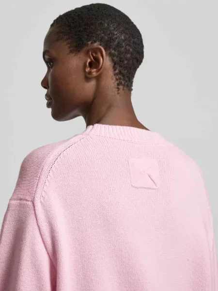 Oversized sweter wełniany z mieszanki wełny Nanushka różowy