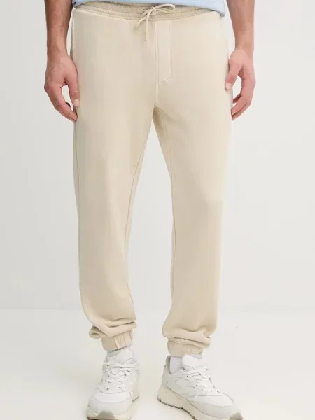 Bombažen spodnji del trenirke Calvin Klein Jeans bež