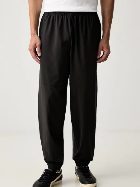Puma pantaloni de trening pentru bărbați PUMATECH negru