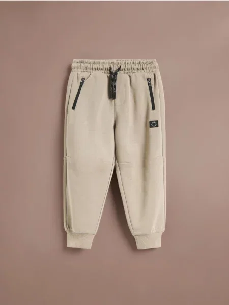 Reserved Pantaloni de trening cu conținut ridicat de bej