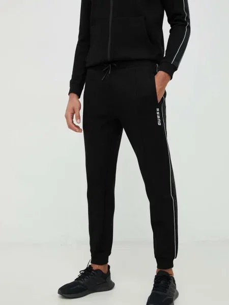 Tepláky Guess s potiskem černá