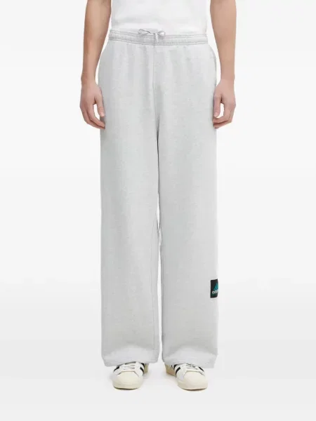 Sneakersy Adidas Predator w paski z dekoltem w serek z kapturem różowe