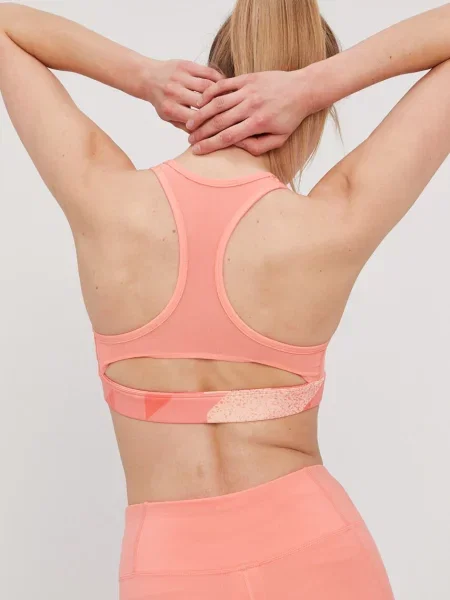 Sportovní podprsenka Reebok vzorovaná oranžová