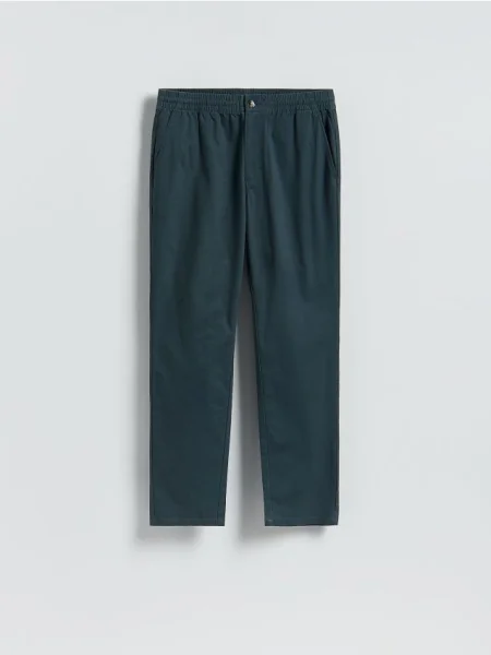 Reserved Spodnie jogger slim granatowy