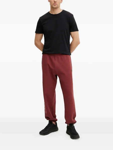 Pantaloni The North Face cu imagine roșu