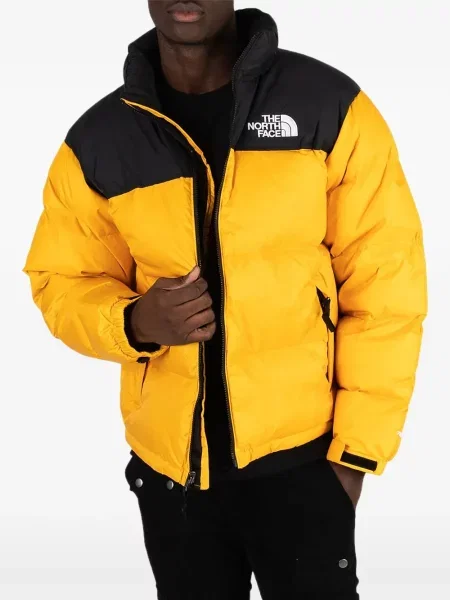 Retro stiliaus striukė The North Face geltona