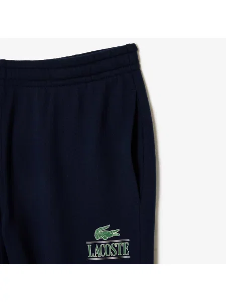 Lacoste Spodnie Dresowe O Zwężanym Kroju Z Nadrukiem granatowy