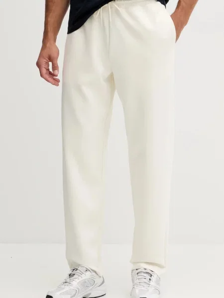 Спортивні штани Emporio Armani однотонні бежевий