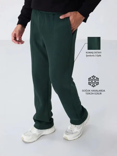 Tommy Life Športne hlače Jogginghose temno zelena