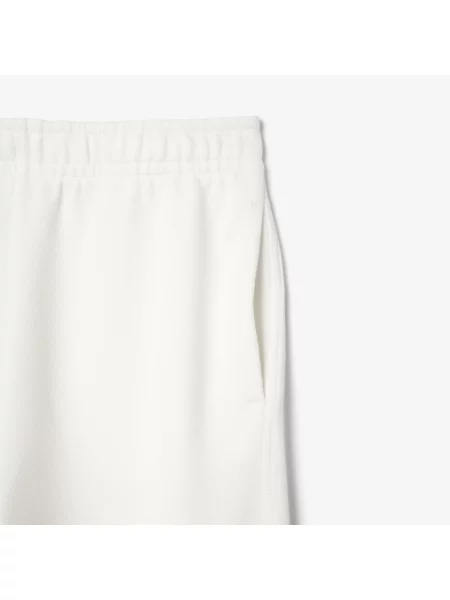 Lacoste Spodnie Dresowe Z Piki Kremowe białe