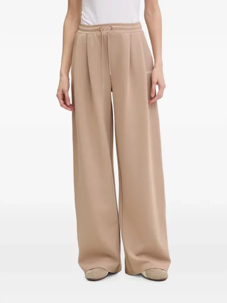Pantaloni Guess cu dungi alergare