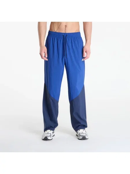 Spodnie New Balance Sport Legacy Pant Blue M niebieski