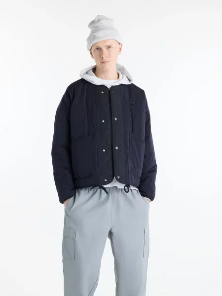 Демісезонна куртка New Balance Balance Quilted синій