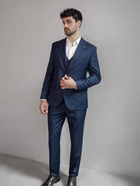 Шерстяной костюм Andreas Moskin в деловом стиле синий