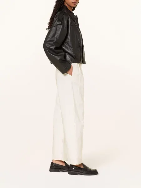 Сhinosy Calvin Klein białe