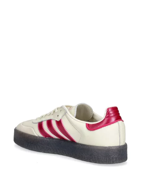 Sneakersy Adidas Predator w paski z dekoltem w serek z kapturem różowe