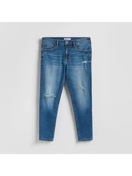Reserved Ošoupané a děravé skinny džíny modrá