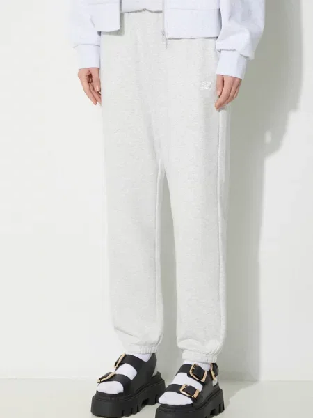 Spodnie New Balance Sport Essentials French Terry Jogger popielato-szare M szare