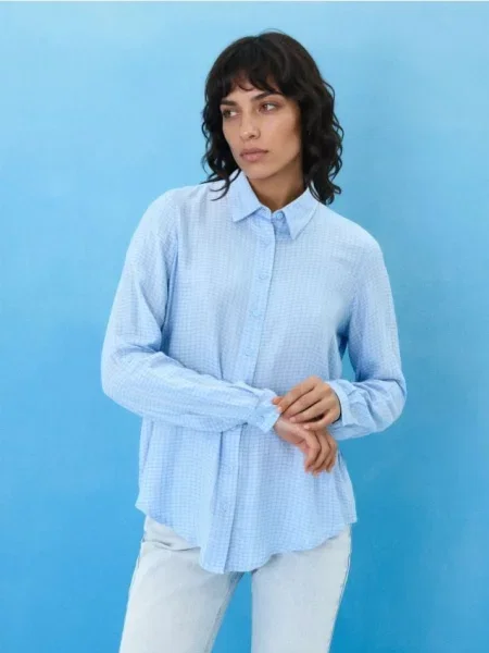 Рубашка в клетку из блакитний