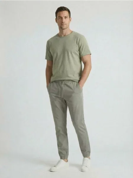 Sinsay kalhoty Jogger zelená