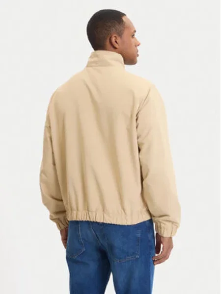 Tommy Jeans Demisezoninė striukė Essential smėlio