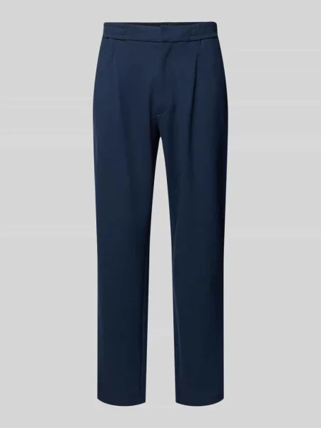 Spodnie materiałowe o kroju slim tapered fit z zakładkami w pasie Ck Calvin Klein granatowe