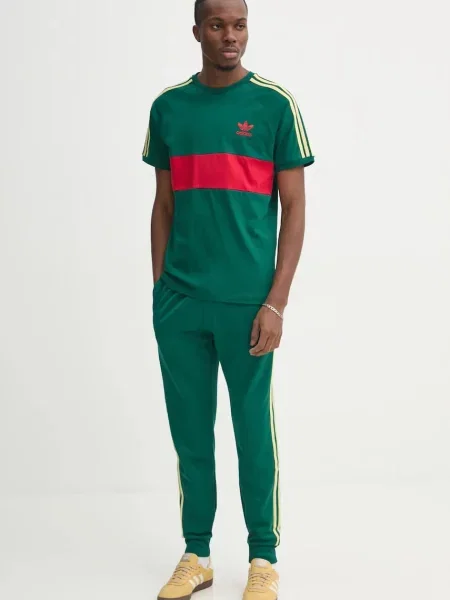 Спортивні штани adidas Originals SST TP з аплікацією зелений