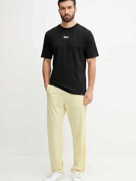 Спортивні штани adidas Originals Firebird однотонні жовтий