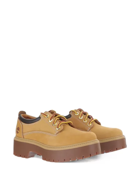 Gatvės stiliaus aulinukai Timberland su platforma akmenys geltona