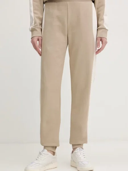 Armani Exchange spodnie dresowe beżowe