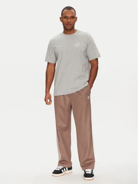 Adidas Долнище анцуг adicolor Firebird Baggy Fit бежов