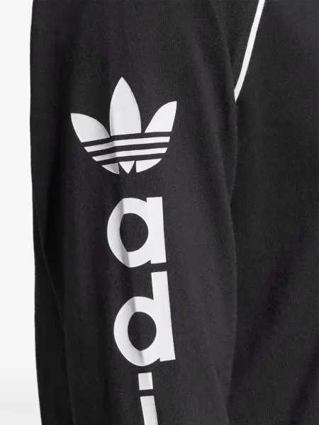 Legginsy Adidas do biegania z nadrukiem z dekoltem w serek czerwone