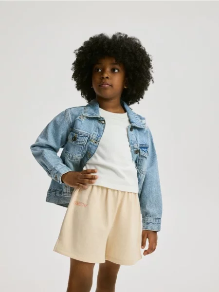 Reserved Шорти з принтом бежевий