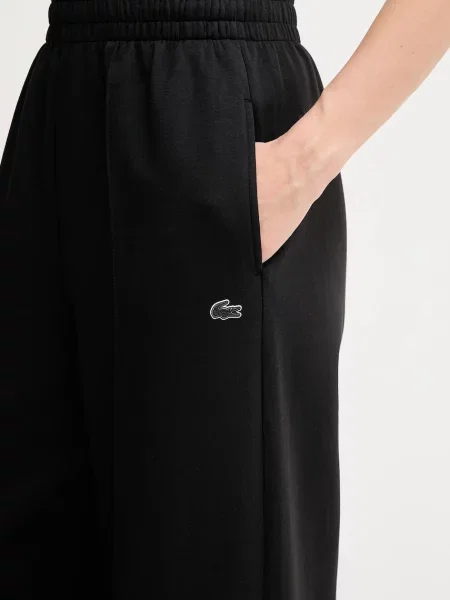 Однотонные спортивные штаны Lacoste белые