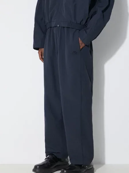 Hlače AMBUSH Nylon Track Pants mornarsko modra