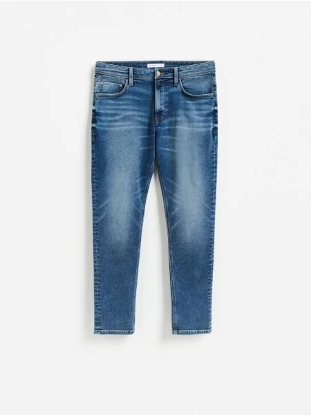 Reserved Jeansy slim fit z efektem sprania niebieski
