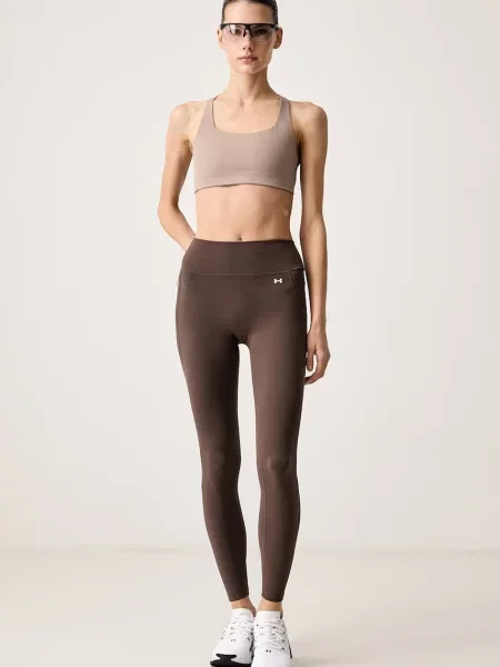 Pantaloni sport Under Armour maro