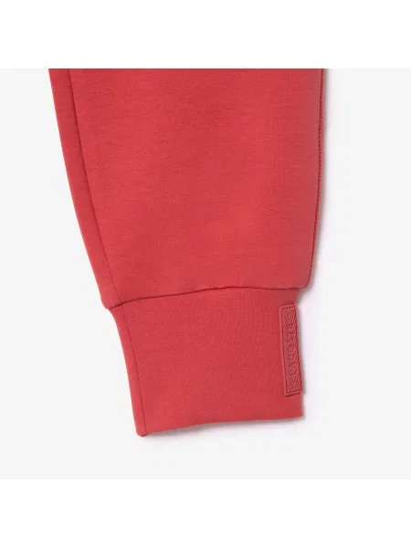 Зауженные спортивные штаны Lacoste розовые