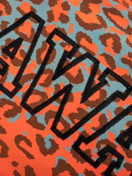 Pantaloni Awake Ny cu imagine cu model leopard portocaliu