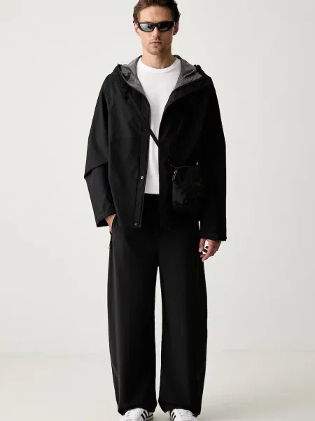 Adidas geacă de tranziție pentru bărbați Essentials negru