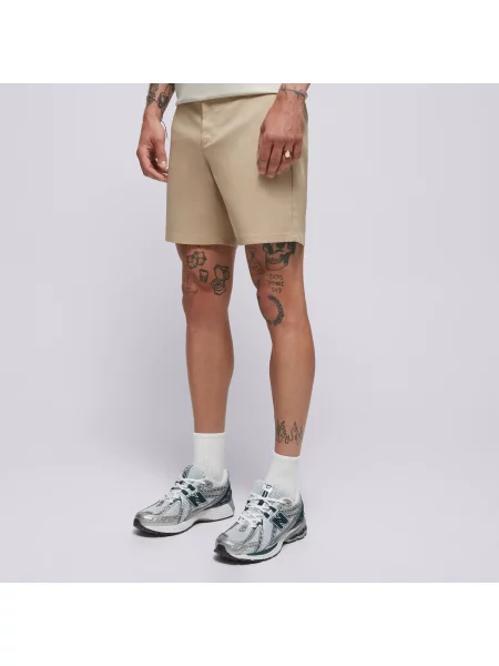New Balance Szorty Athletics Standard Short 7" beżowe