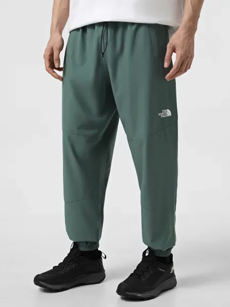Джогери The North Face Ma Wind поліестер/еластан зелений