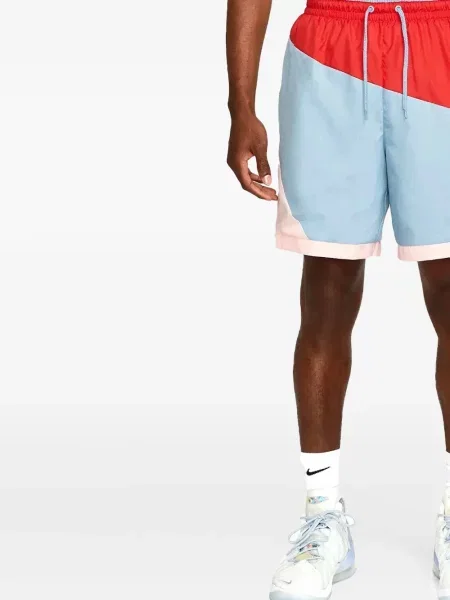 Krátké fleecové kraťasy Nike s potiskem žluté