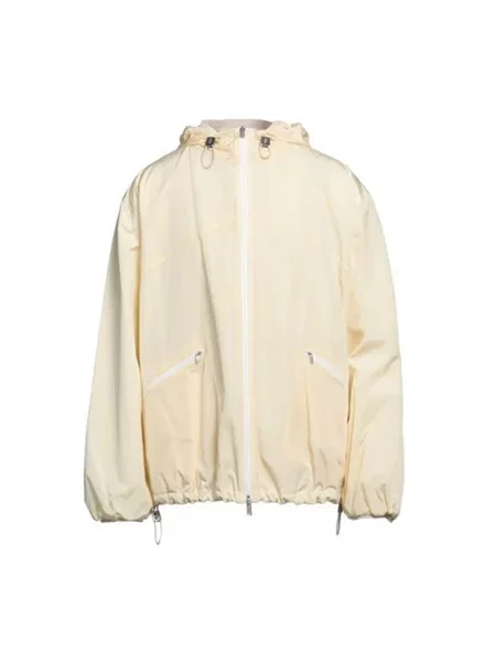 Kurtka Jil Sander z kapturem żółta