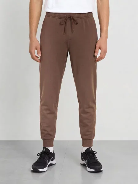Nike Spodnie Treningowe Primary Nanoknit braun