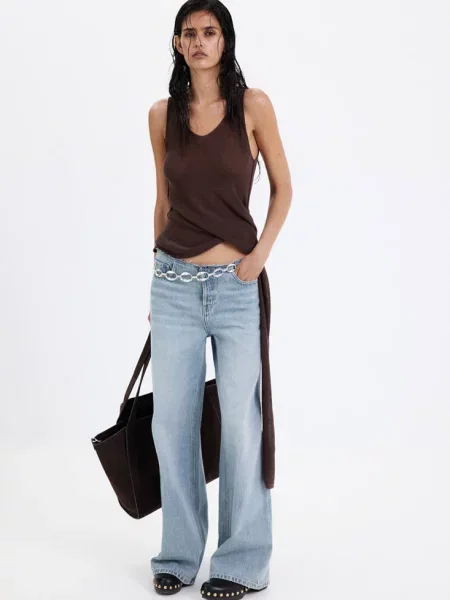 Jeansy wide leg z postrzępioną talią średni Kobieta 46 MANGO niebieski