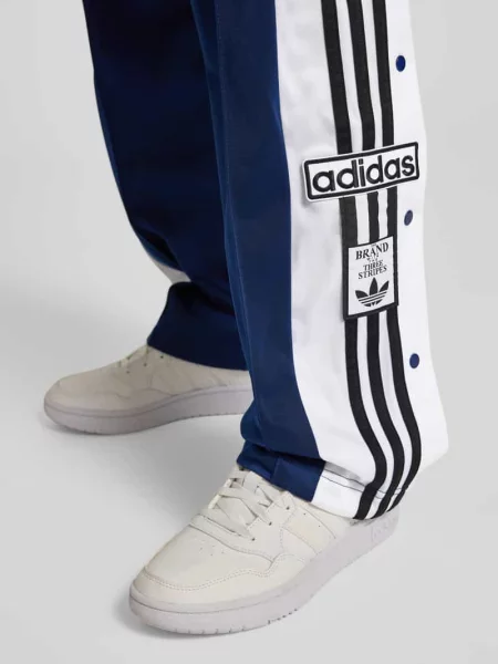 Spodnie dresowe o prostym kroju z elastycznym pasem Model „Adibreak” Adidas Originals