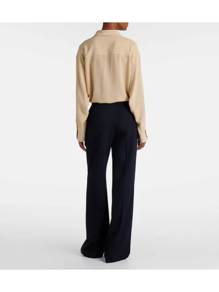 Pantaloni The Row de lână albastru