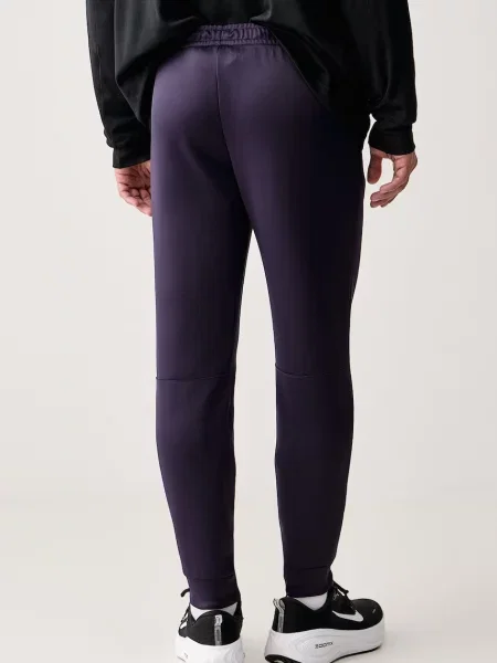 Nike spodnie treningowe Hyverse UV Dri-FIT fioletowe