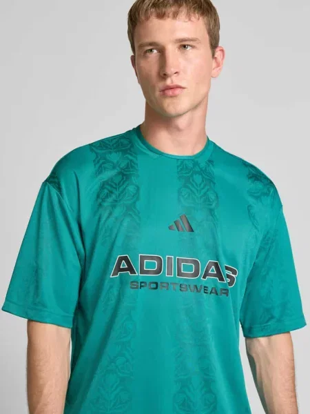 T-shirt o kroju regular fit z nadrukiem z logo model ‘Tiro’ Adidas Sportswear